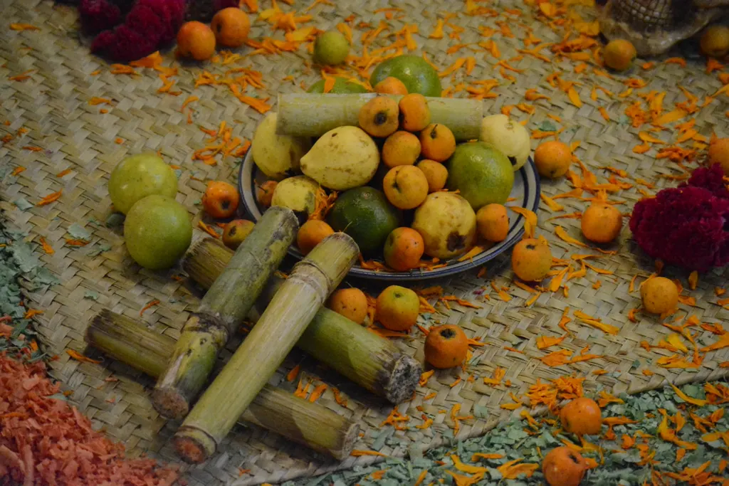 Ofrenda med frugt, sukkerrør og tagetes